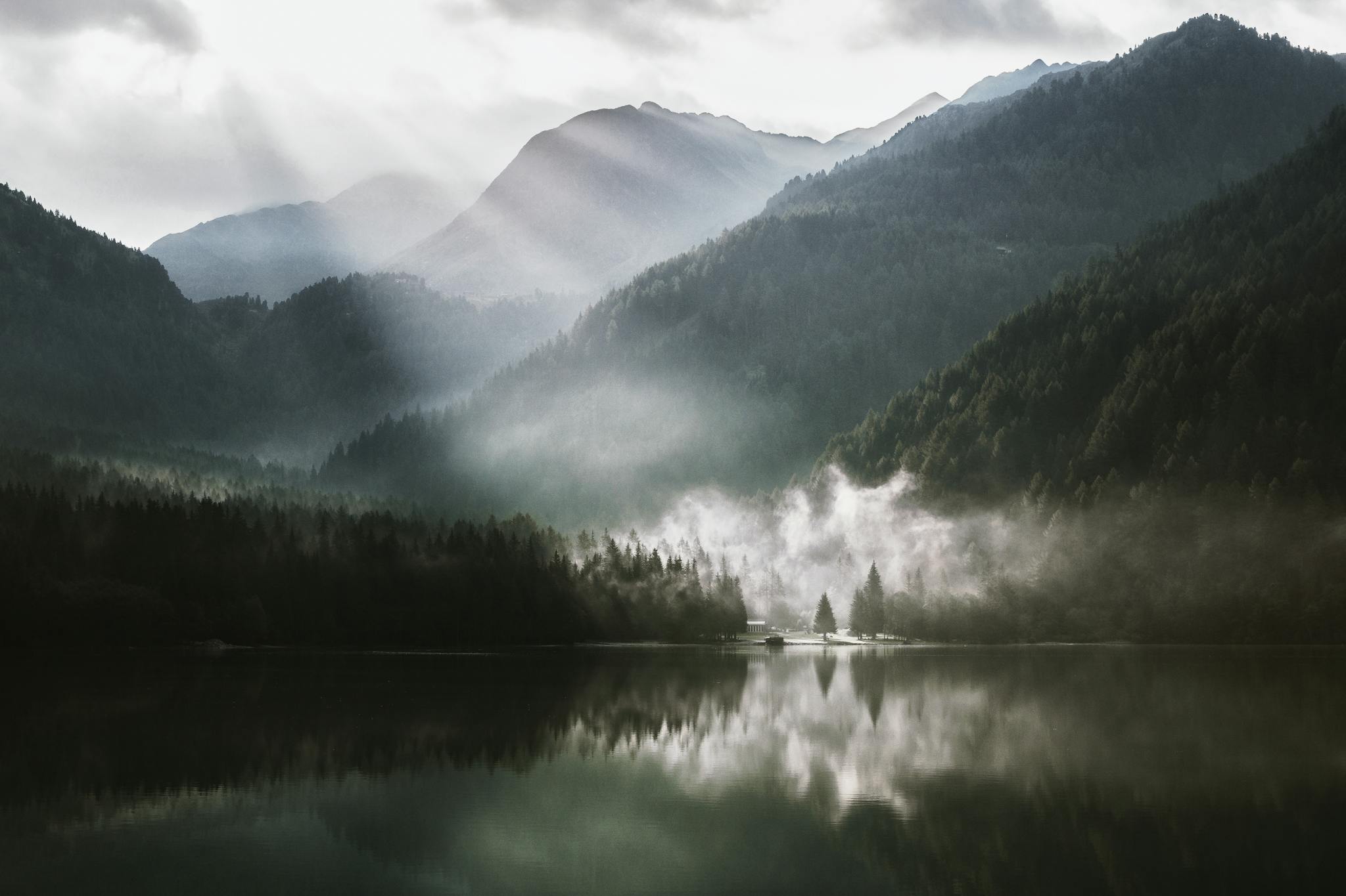 Lake Surrounded With Mountain